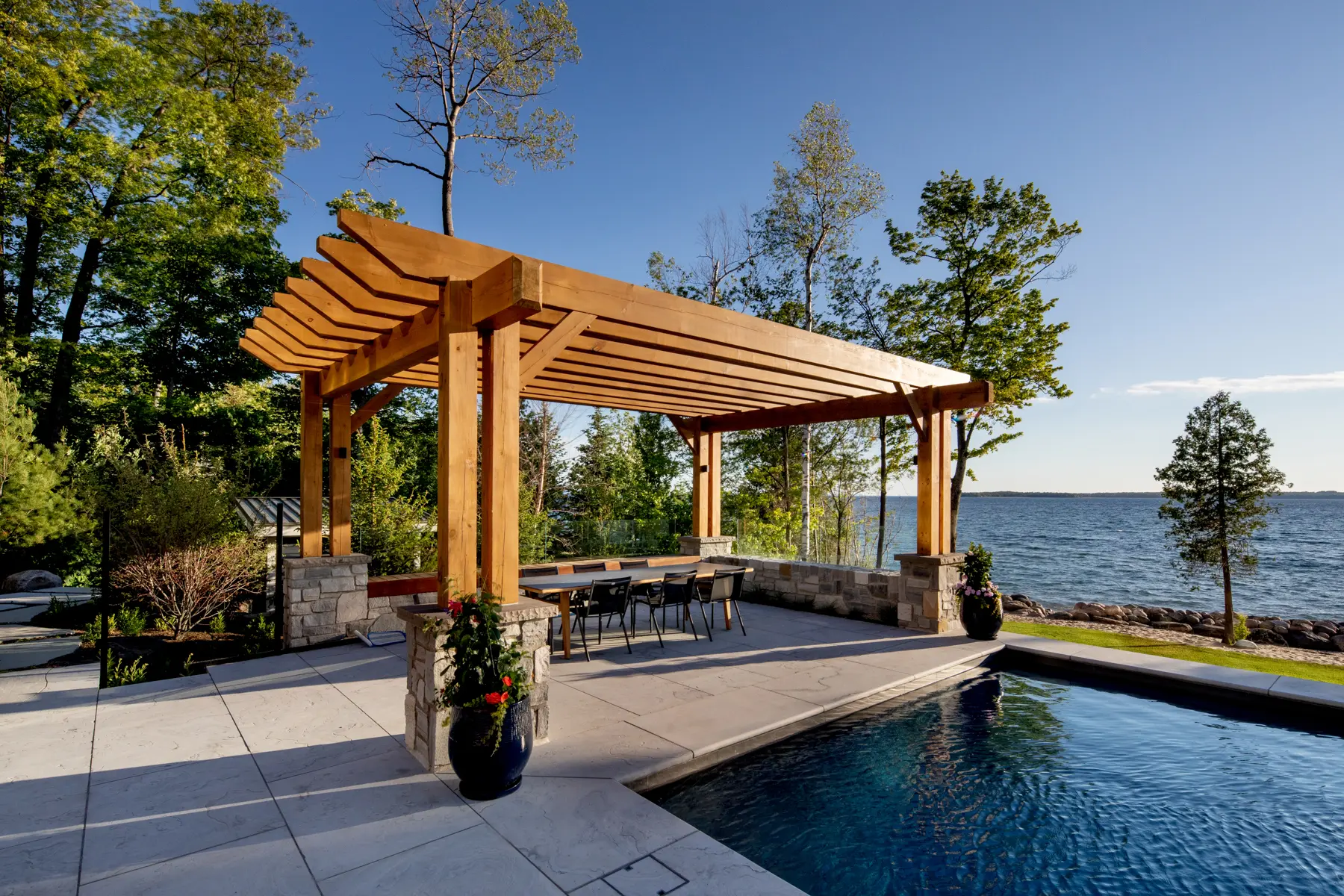 Normerica Timber Homes Timber Frame Portfolio Beachside Bliss Exterior Pool Timber Pergola Outdoor Dining Outdoor Entertaining