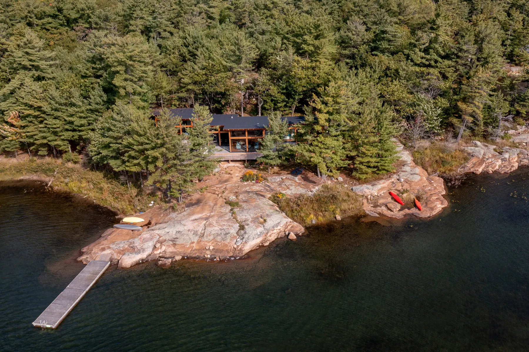 Georgian Bay Cottage Exterior Aerial Dock and Cottage Normerica Timber Homes
