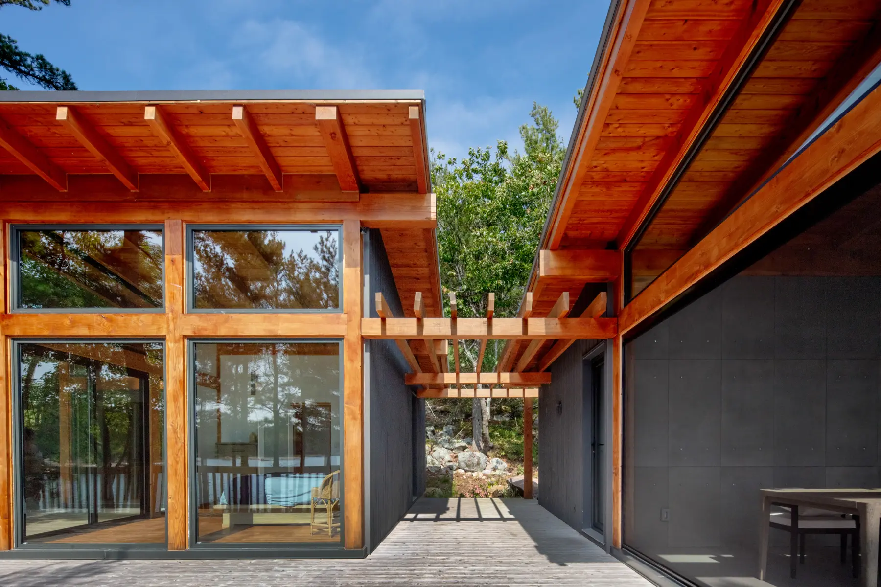 Georgian Bay Cottage Exterior Connection of Main Pod and Sleeping Pod Normerica Timber Homes