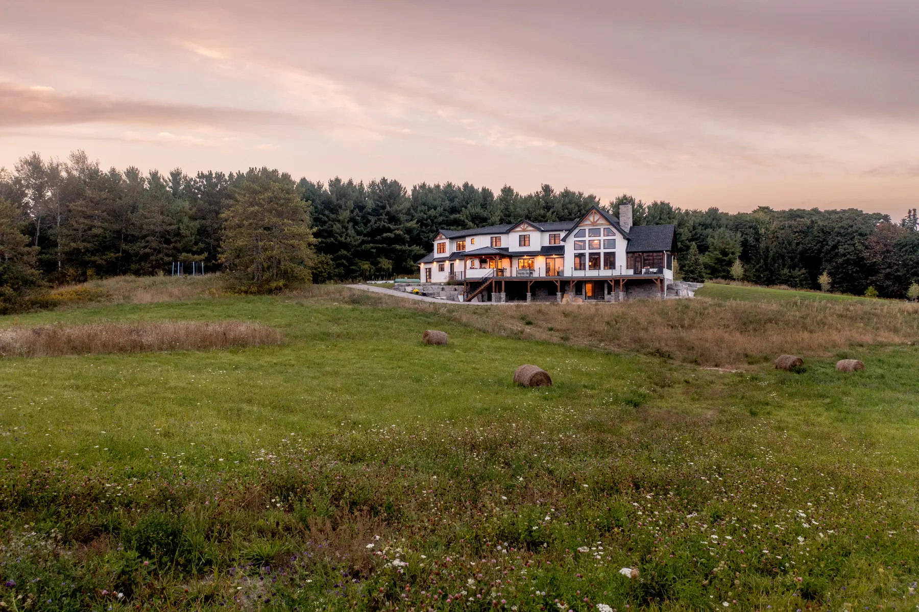 Modern Farmhouse Exterior Aerial View Back Evening Normerica Timber Homes