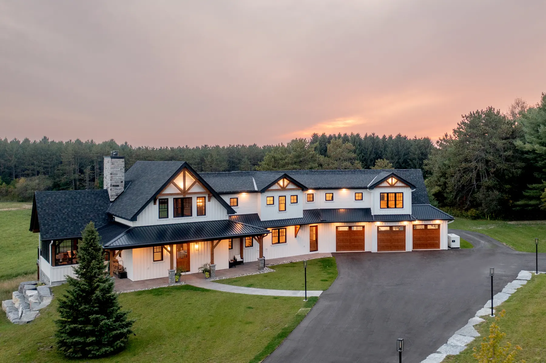 Modern Farmhouse Exterior Aerial View Front Close Evening Normerica Timber Homes