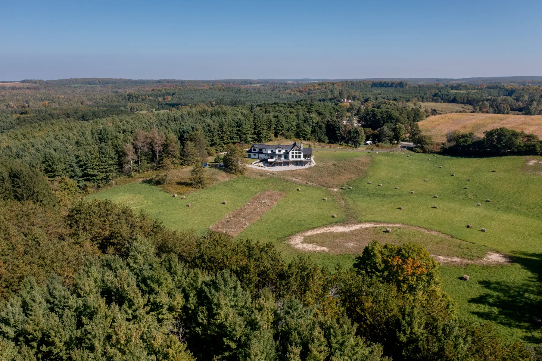 Modern Farmhouse Exterior Aerial View Rear from Far Normerica Timber Homes