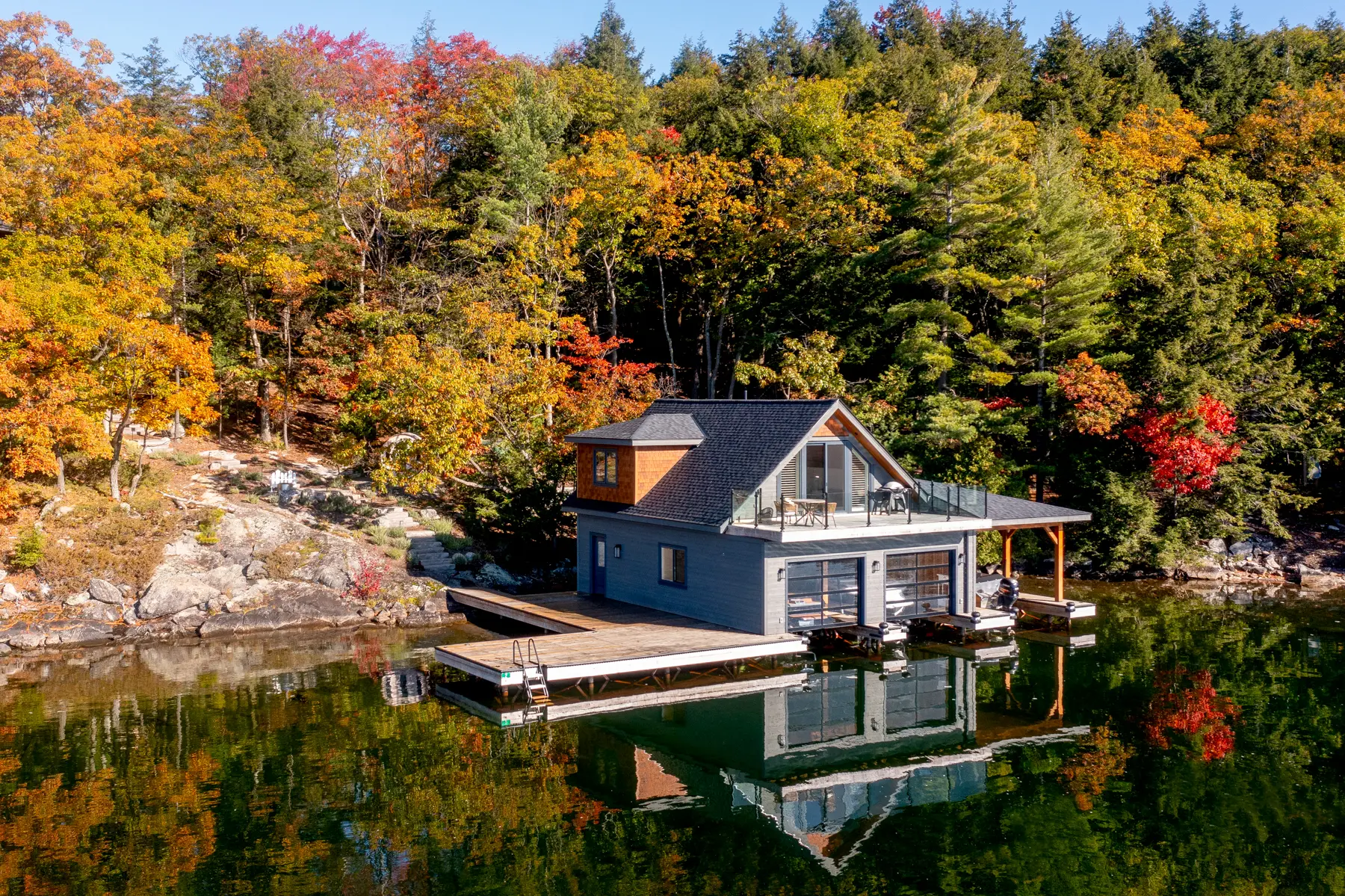 Muskoka Island Cottage Exterior Boathouse and Dock Normerica