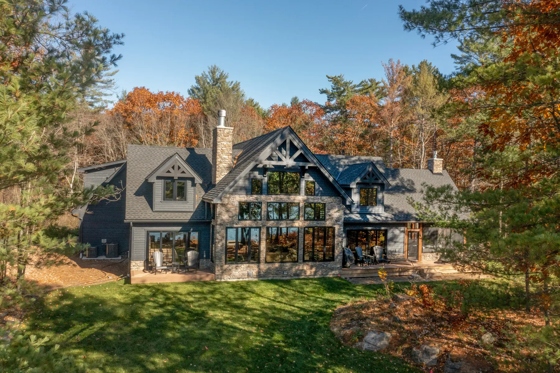 Traditional Lakeside Cottage Lakeside Escape Project Portfolio Exterior Back Aerial Daytime Normerica Timber Homes