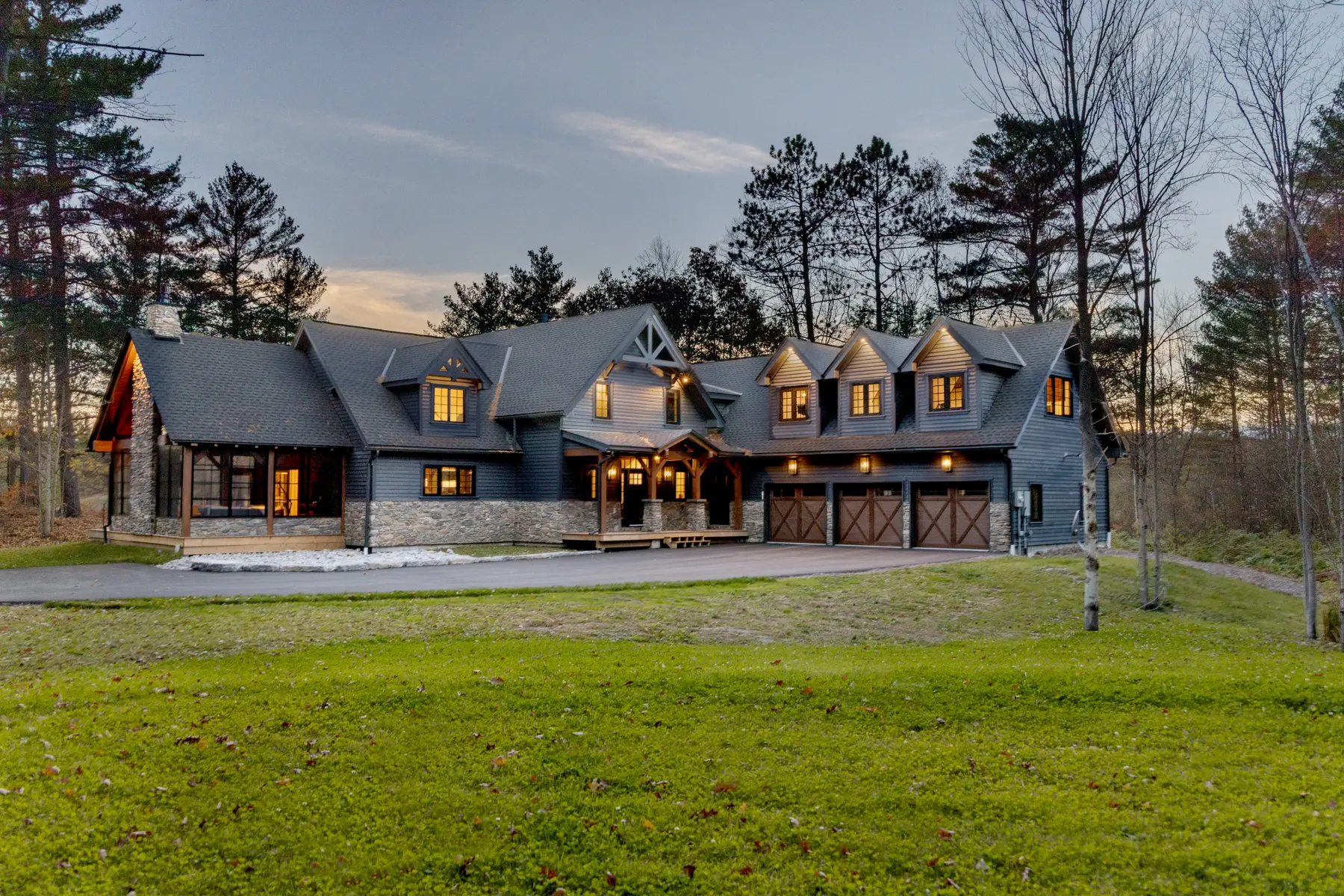 Traditional Lakeside Cottage Lakeside Escape Project Portfolio Exterior Evening Front Normerica Timber Homes