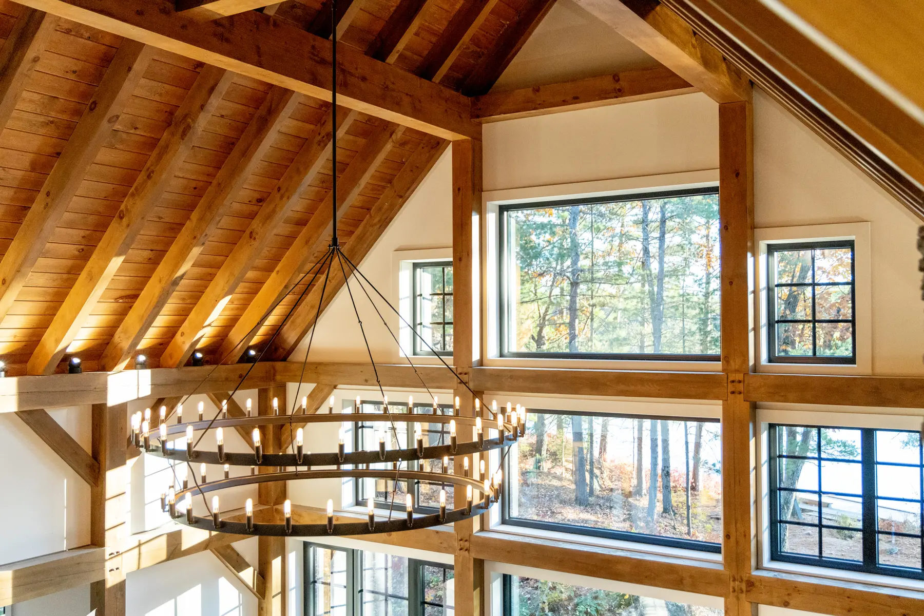 Traditional Lakeside Cottage Lakeside Escape Project Portfolio Interior Great Room Ceiling Timber Frame Window Wall Normerica Timber Homes