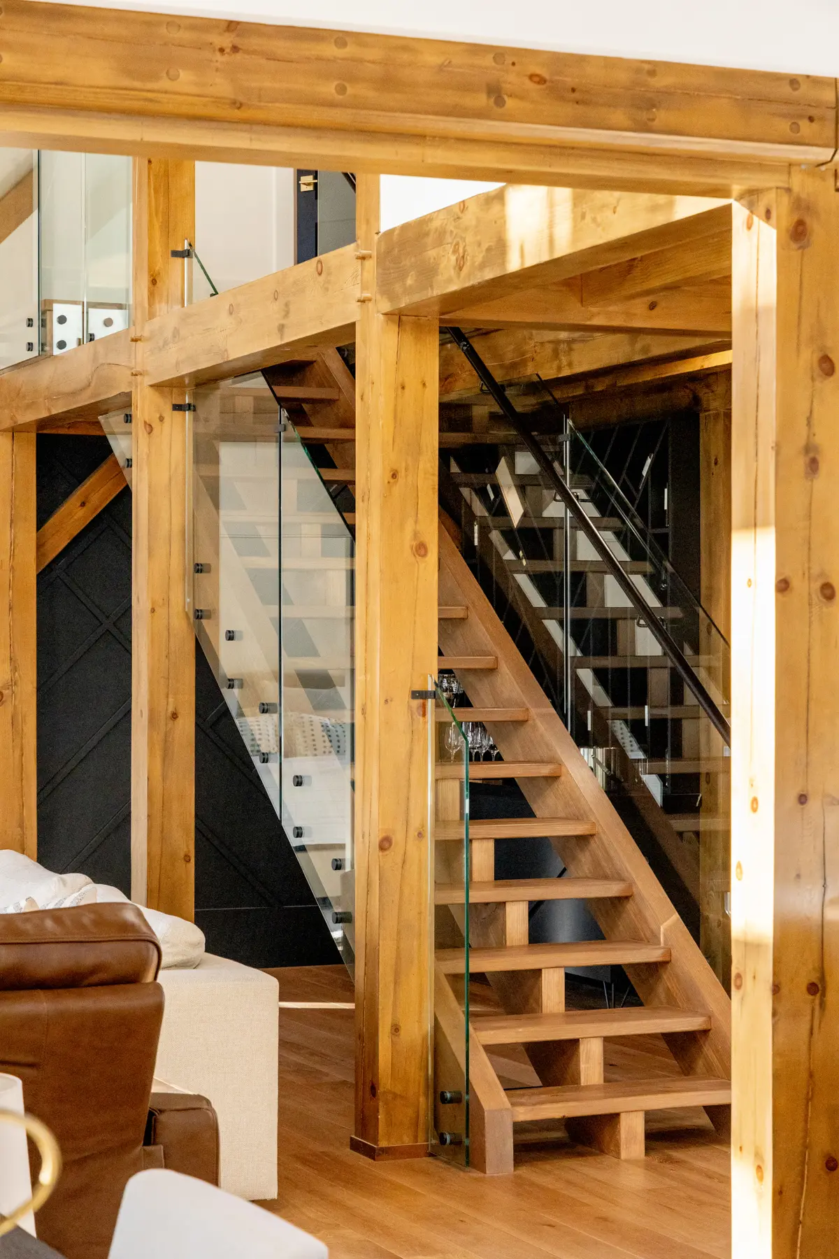 Traditional Lakeside Cottage Lakeside Escape Project Portfolio Interior Stairs Glass Railing Great Room Loft Normerica Timber Homes