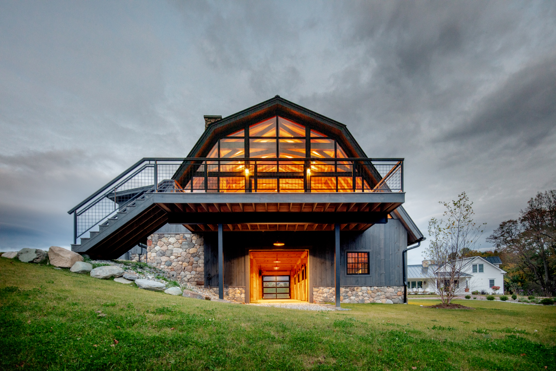 Timber Frame Barn House, Exterior, Night Window Trusses, Normerica Timber Homes