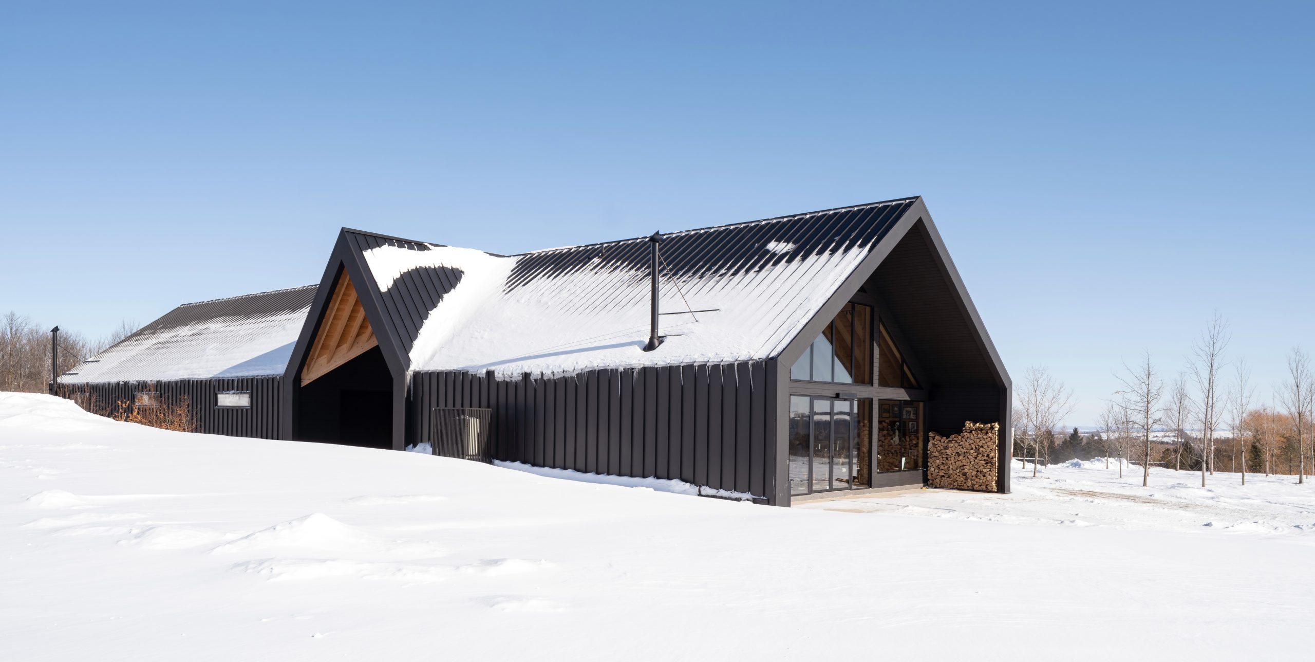 gateway to a rural getaway timber frame gatehouse normerica exterior angle 2