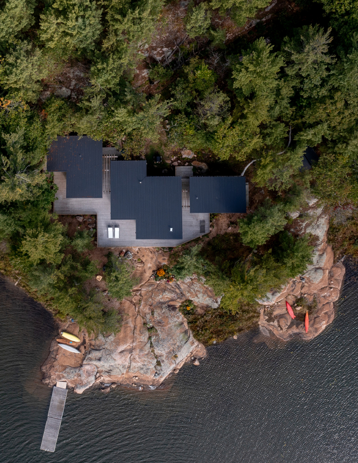 Normerica drone lake edge island timber frame cottage